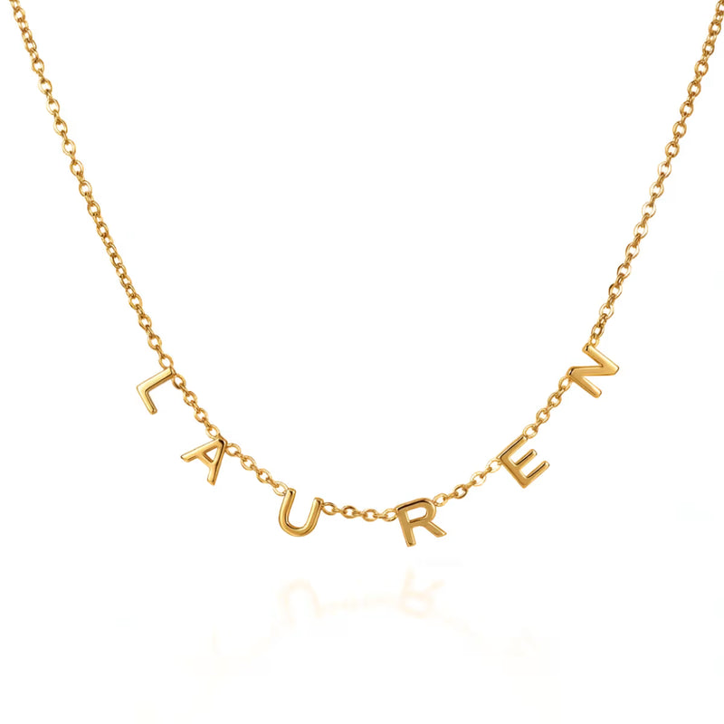 Dangling letter initial necklace in 18k gold personalised gift UK