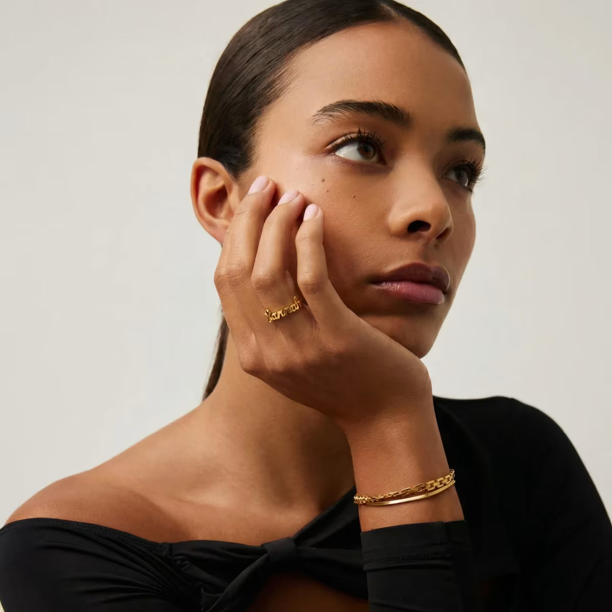 Personalised 3D Name Ring worn on hand showing gold finish