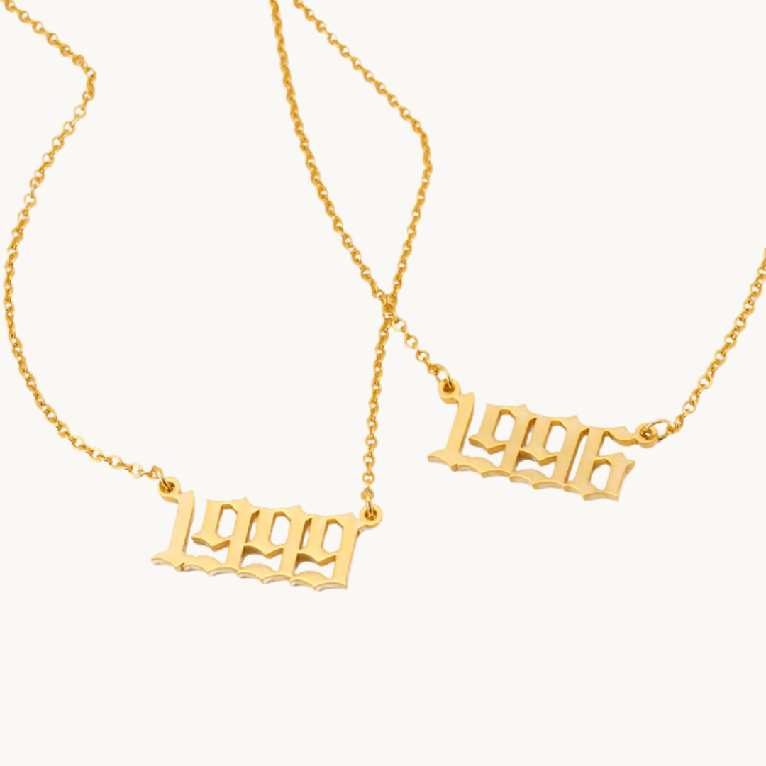 smiling woman wearing tennis necklace with gold zirconia – elegant jewellery for summer