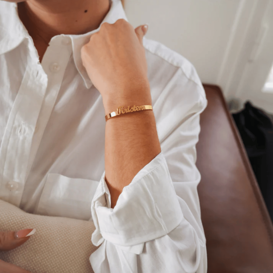 personalised gold cuff bracelet lifestyle shot – engraved jewelry