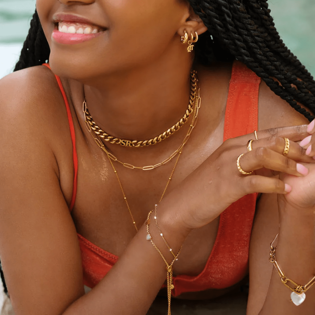 personalised initial necklace in chunky gold curb chain – adjustable clasp