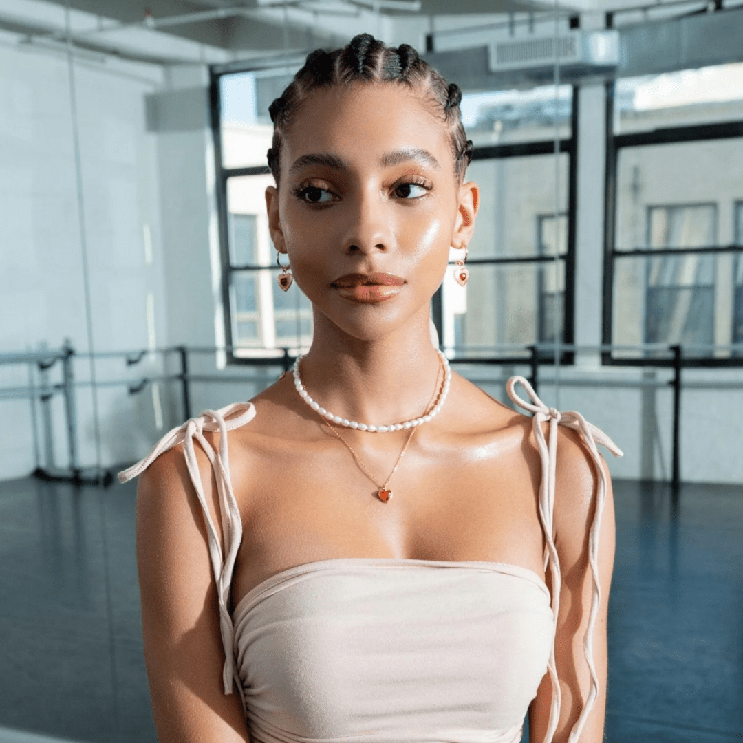 close-up of carnelian heart necklace on skin – sensual and grounding accessory
