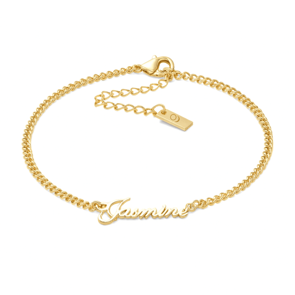 woman wearing personalised gold name anklet on ankle waterproof summer festival jewellery